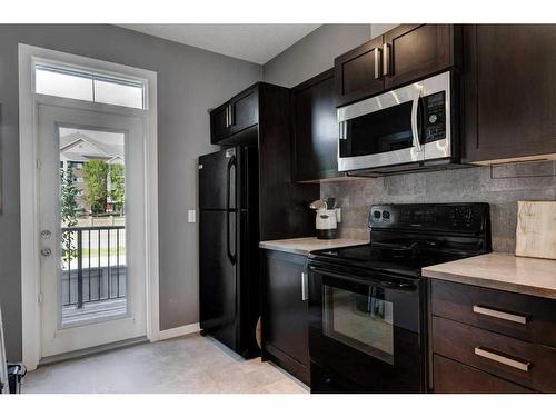 170 New Brighton Point Se, Calgary, AB - Indoor Photo Showing Kitchen