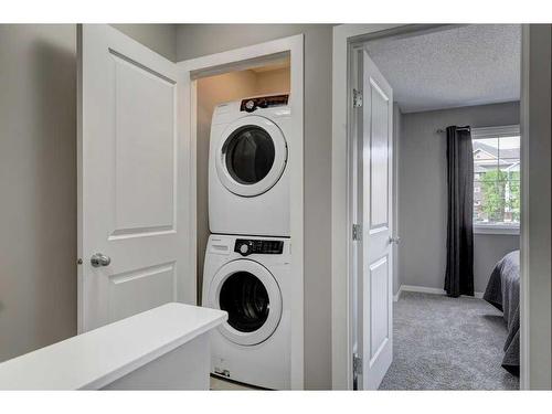 170 New Brighton Point Se, Calgary, AB - Indoor Photo Showing Laundry Room