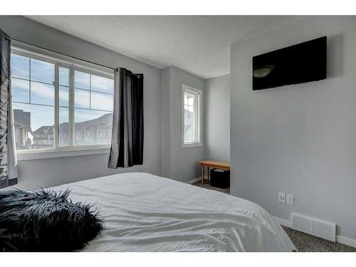 170 New Brighton Point Se, Calgary, AB - Indoor Photo Showing Bedroom