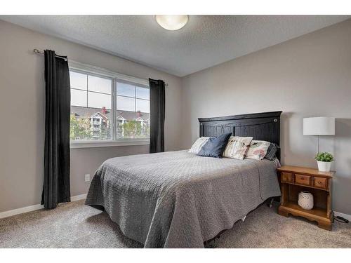 170 New Brighton Point Se, Calgary, AB - Indoor Photo Showing Bedroom