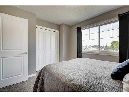 170 New Brighton Point Se, Calgary, AB - Indoor Photo Showing Bedroom