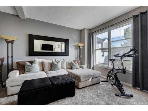 170 New Brighton Point Se, Calgary, AB - Indoor Photo Showing Living Room