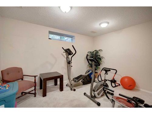 134 Riverwood Crescent Se, Calgary, AB - Indoor Photo Showing Gym Room