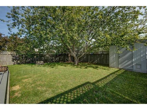 134 Riverwood Crescent Se, Calgary, AB - Outdoor With Backyard