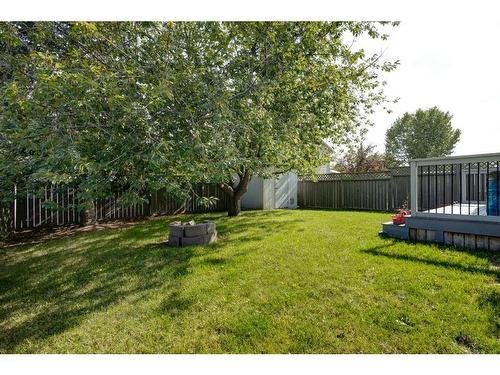 134 Riverwood Crescent Se, Calgary, AB - Outdoor With Backyard