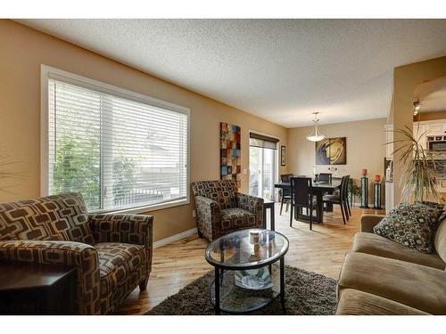 134 Riverwood Crescent Se, Calgary, AB - Indoor Photo Showing Living Room