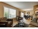 134 Riverwood Crescent Se, Calgary, AB  - Indoor Photo Showing Living Room 