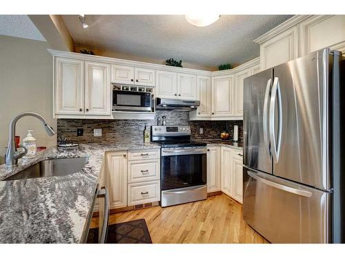 134 Riverwood Crescent Se, Calgary, AB - Indoor Photo Showing Kitchen With Stainless Steel Kitchen