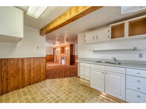 1624 19 Avenue Nw, Calgary, AB - Indoor Photo Showing Kitchen With Double Sink