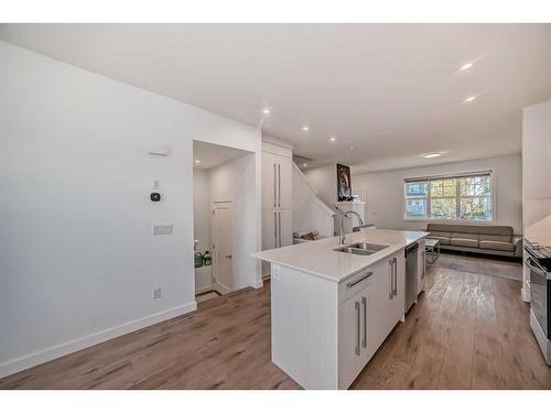 238 Dawson Way, Chestermere, AB - Indoor Photo Showing Kitchen With Double Sink