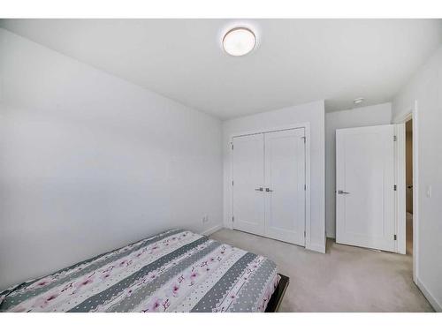 238 Dawson Way, Chestermere, AB - Indoor Photo Showing Bedroom