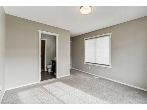 1111-125 Panatella Way Nw, Calgary, AB - Indoor Photo Showing Other Room