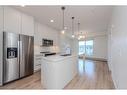 1424-76 Cornerstone Passage Ne, Calgary, AB  - Indoor Photo Showing Kitchen With Double Sink With Upgraded Kitchen 