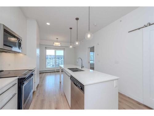 1424-76 Cornerstone Passage Ne, Calgary, AB - Indoor Photo Showing Kitchen With Double Sink With Upgraded Kitchen