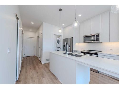 1424-76 Cornerstone Passage Ne, Calgary, AB - Indoor Photo Showing Kitchen With Double Sink With Upgraded Kitchen