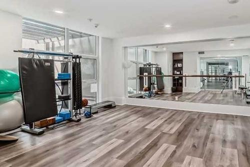 2203-1111 10 Street Sw, Calgary, AB - Indoor Photo Showing Gym Room