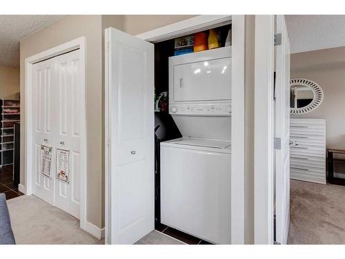 1416-625 Glenbow Drive, Cochrane, AB - Indoor Photo Showing Laundry Room