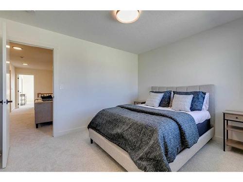 124 Heritage Boulevard, Cochrane, AB - Indoor Photo Showing Bedroom