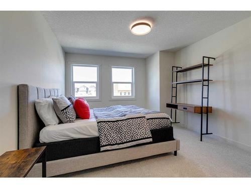 124 Heritage Boulevard, Cochrane, AB - Indoor Photo Showing Bedroom