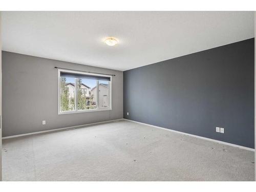 16 Drake Landing Mews, Okotoks, AB - Indoor Photo Showing Other Room