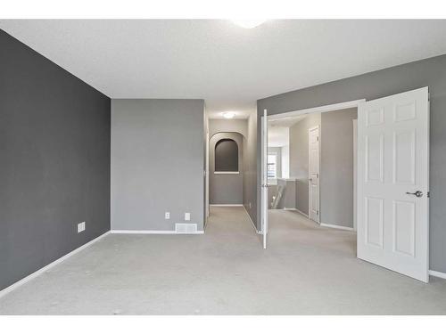 16 Drake Landing Mews, Okotoks, AB - Indoor Photo Showing Other Room