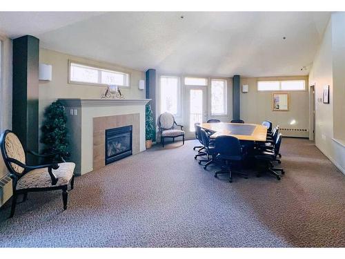 303-2416 Erlton Street Sw, Calgary, AB - Indoor With Fireplace