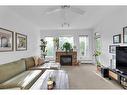 303-2416 Erlton Street Sw, Calgary, AB  - Indoor Photo Showing Living Room With Fireplace 