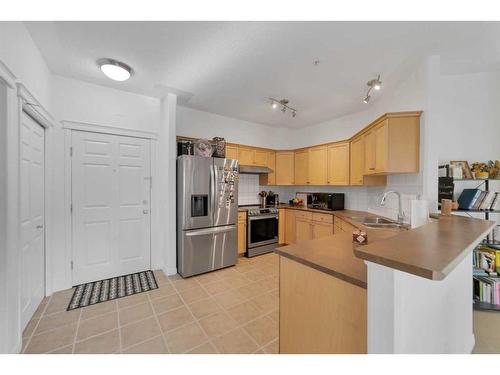 303-2416 Erlton Street Sw, Calgary, AB - Indoor Photo Showing Kitchen With Stainless Steel Kitchen With Double Sink