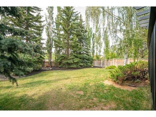 104 Christie Knoll Heights Sw, Calgary, AB - Outdoor With Backyard