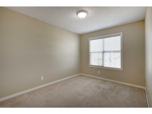 1047 Copperfield Boulevard Se, Calgary, AB - Indoor Photo Showing Other Room