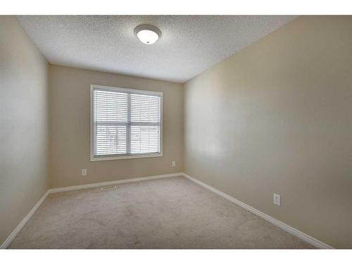 1047 Copperfield Boulevard Se, Calgary, AB - Indoor Photo Showing Other Room