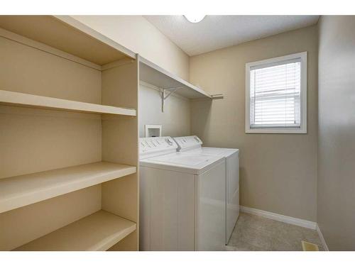 1047 Copperfield Boulevard Se, Calgary, AB - Indoor Photo Showing Laundry Room