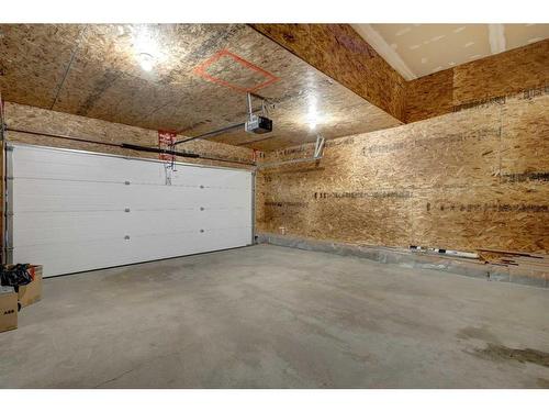 1047 Copperfield Boulevard Se, Calgary, AB - Indoor Photo Showing Garage