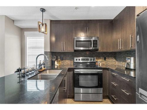 5202-155 Skyview Ranch Way Ne, Calgary, AB - Indoor Photo Showing Kitchen With Double Sink With Upgraded Kitchen