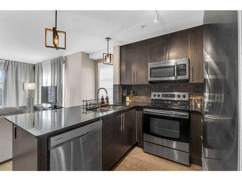 5202-155 Skyview Ranch Way Ne, Calgary, AB - Indoor Photo Showing Kitchen With Double Sink With Upgraded Kitchen