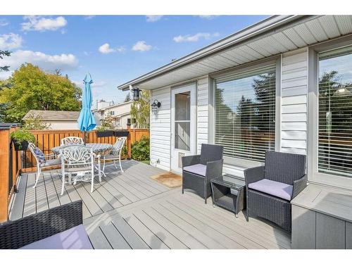 75 Woodglen Road Sw, Calgary, AB - Outdoor With Deck Patio Veranda With Exterior