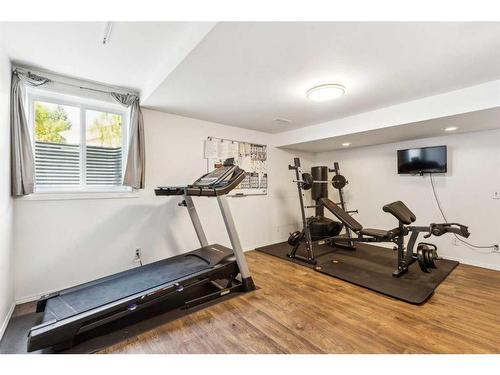 75 Woodglen Road Sw, Calgary, AB - Indoor Photo Showing Gym Room