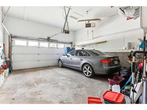 75 Woodglen Road Sw, Calgary, AB - Indoor Photo Showing Garage