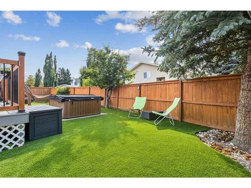 75 Woodglen Road Sw, Calgary, AB - Outdoor With Deck Patio Veranda With Backyard