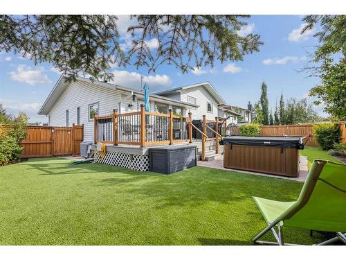 75 Woodglen Road Sw, Calgary, AB - Outdoor With Deck Patio Veranda With Backyard