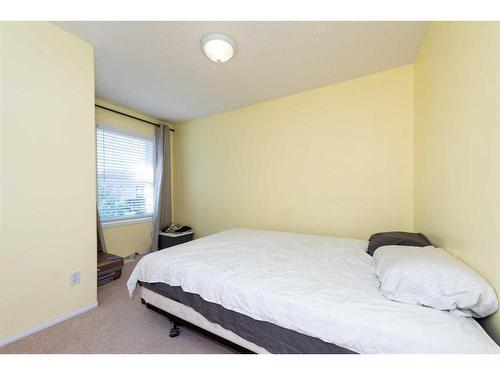 154 Bridlewood Court Sw, Calgary, AB - Indoor Photo Showing Bedroom