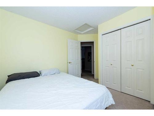 154 Bridlewood Court Sw, Calgary, AB - Indoor Photo Showing Bedroom