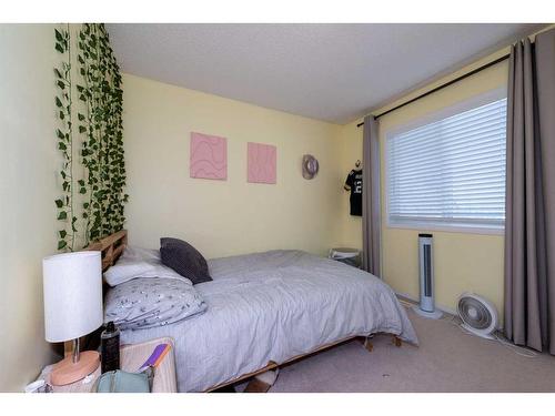 154 Bridlewood Court Sw, Calgary, AB - Indoor Photo Showing Bedroom