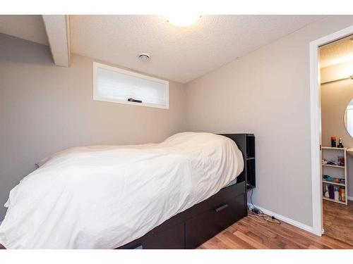 154 Bridlewood Court Sw, Calgary, AB - Indoor Photo Showing Bedroom