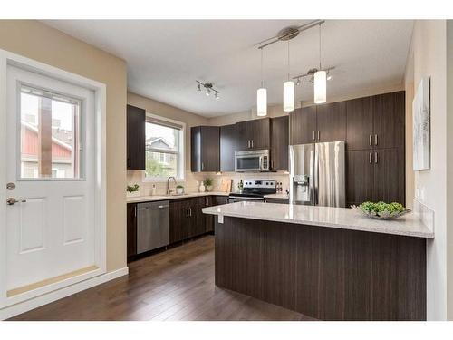 604-10 Auburn Bay Avenue Se, Calgary, AB - Indoor Photo Showing Kitchen With Stainless Steel Kitchen With Upgraded Kitchen