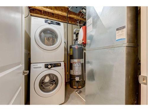 604-10 Auburn Bay Avenue Se, Calgary, AB - Indoor Photo Showing Laundry Room