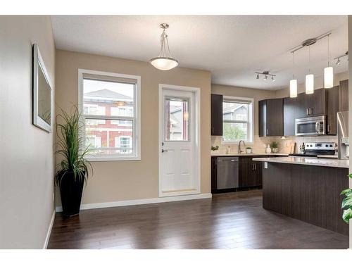 604-10 Auburn Bay Avenue Se, Calgary, AB - Indoor Photo Showing Kitchen With Upgraded Kitchen