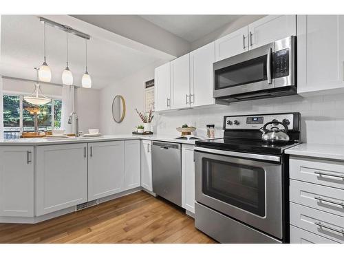 54 Royal Birkdale Crescent Nw, Calgary, AB - Indoor Photo Showing Kitchen With Stainless Steel Kitchen With Double Sink With Upgraded Kitchen