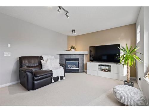 54 Royal Birkdale Crescent Nw, Calgary, AB - Indoor Photo Showing Living Room With Fireplace