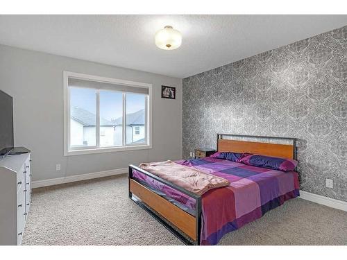 58 Cranberry Mews Se, Calgary, AB - Indoor Photo Showing Bedroom